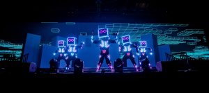 Cirque Bijou - Light Energy Dance - Dancers wearing LED suits perform in front of video mapped backdrop