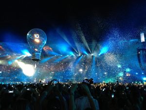 Cirque Bijou - A giant lightbulb flies over crowds at Muse stadium tour