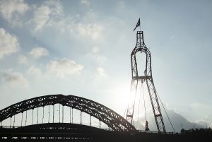 A landscape image of the Wearmouth Bridge with highwire platform in place. Portolan, Sunderland Tall Ships, Cirque Bijou. Image Dan Prince.