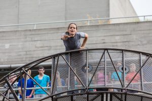 Extraordinary Bodies performer Aislinn Mulligan in What Am I Worth? National Theatre River Stage. Image Rob Harris.
