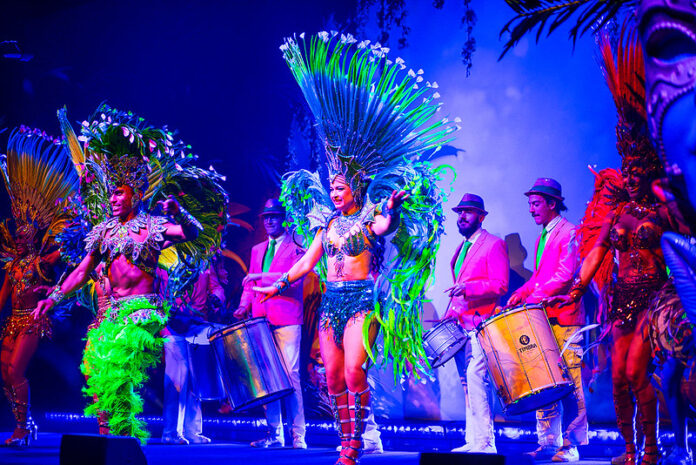 Colourful brazilian dancers perform on stage