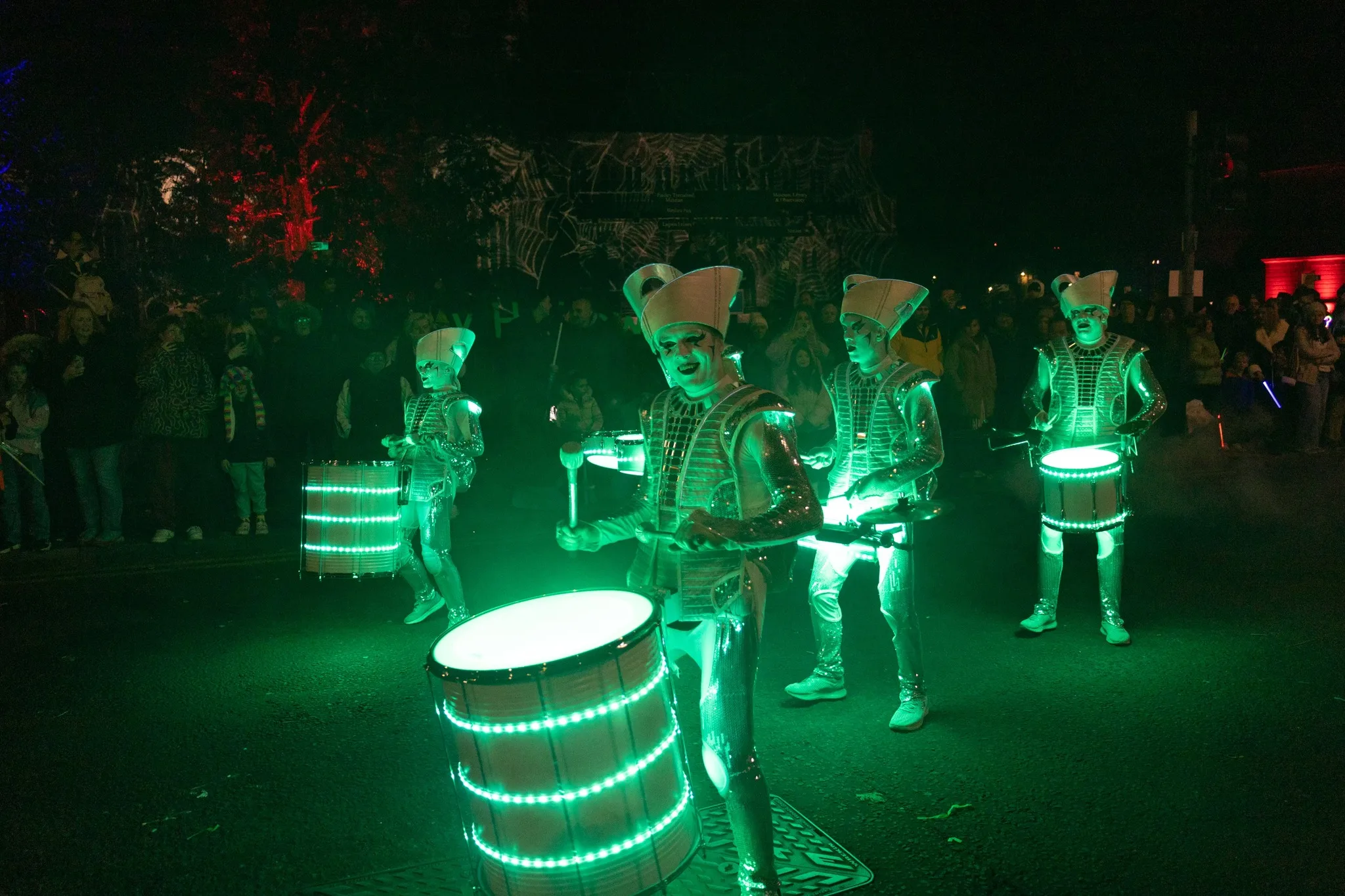 Ghostly space drummers with light up drums leading the parade