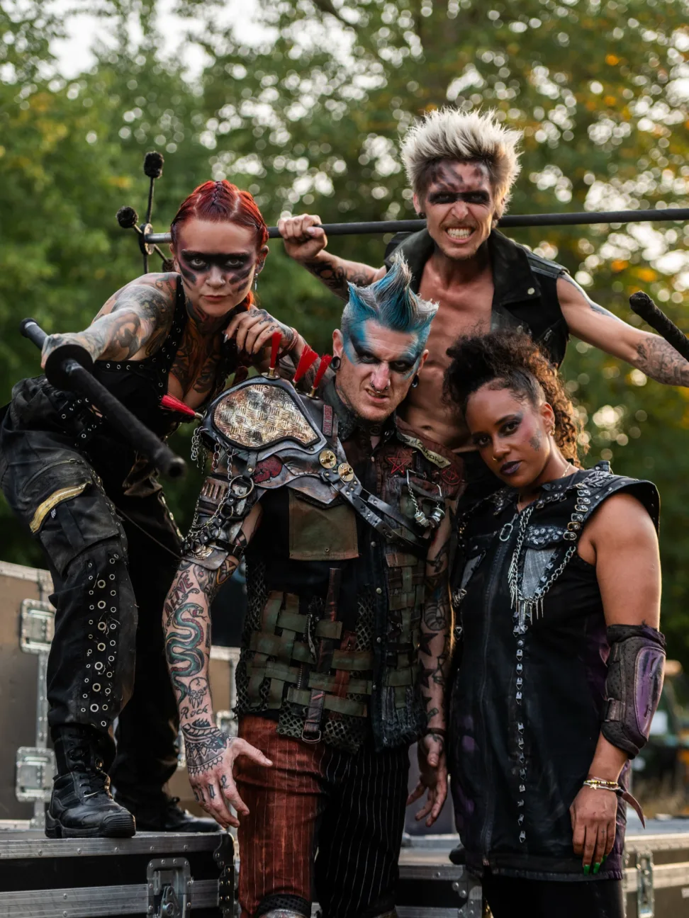 Group photo of four post apocalyptic warriors.